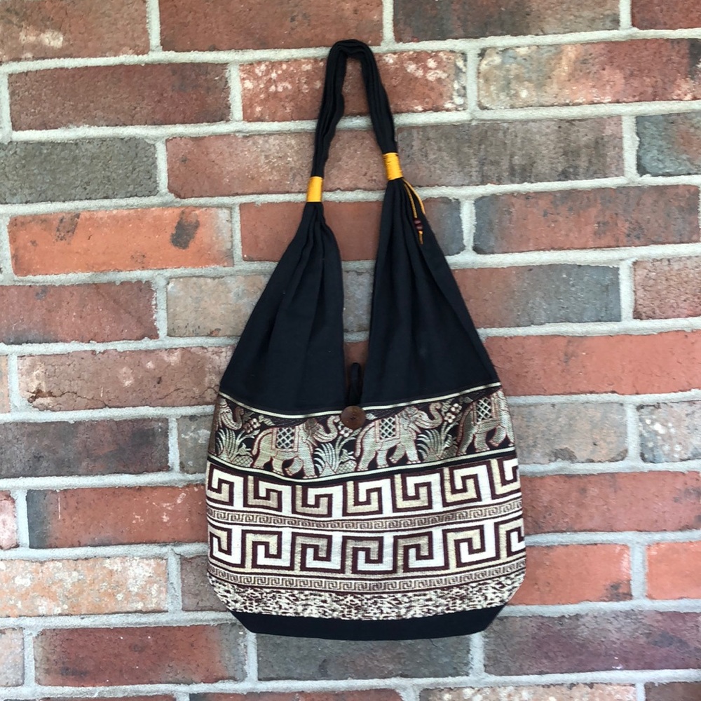 Black bag with elephants